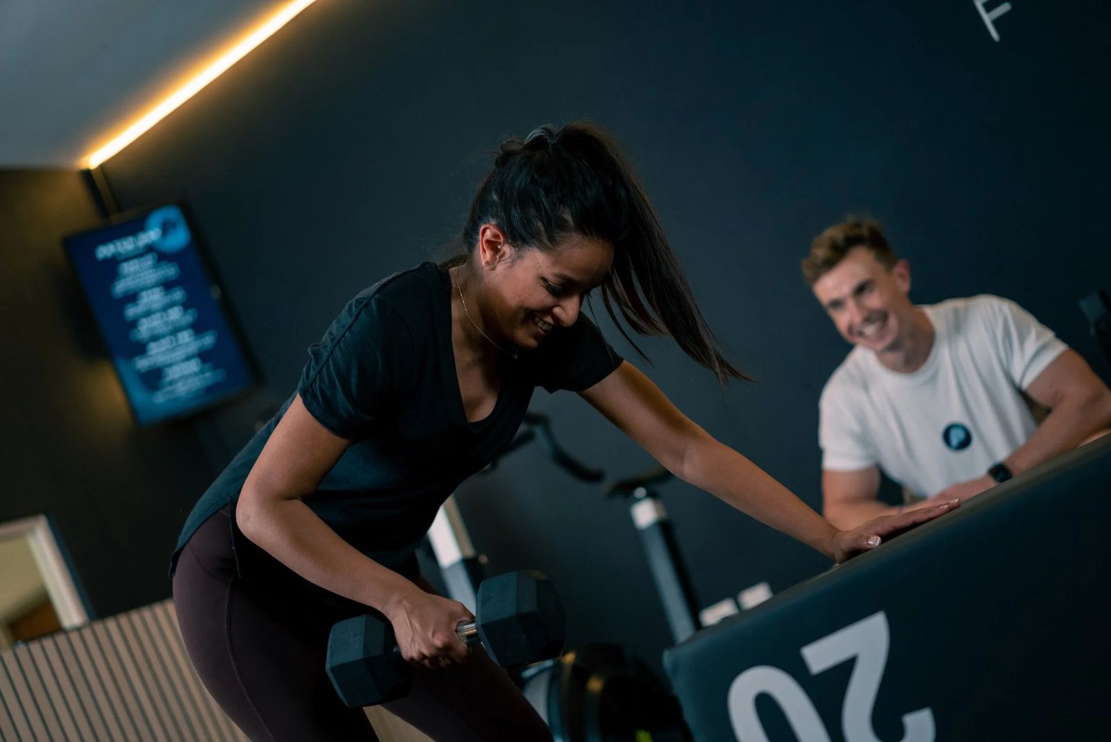 A coach cheering a member on.